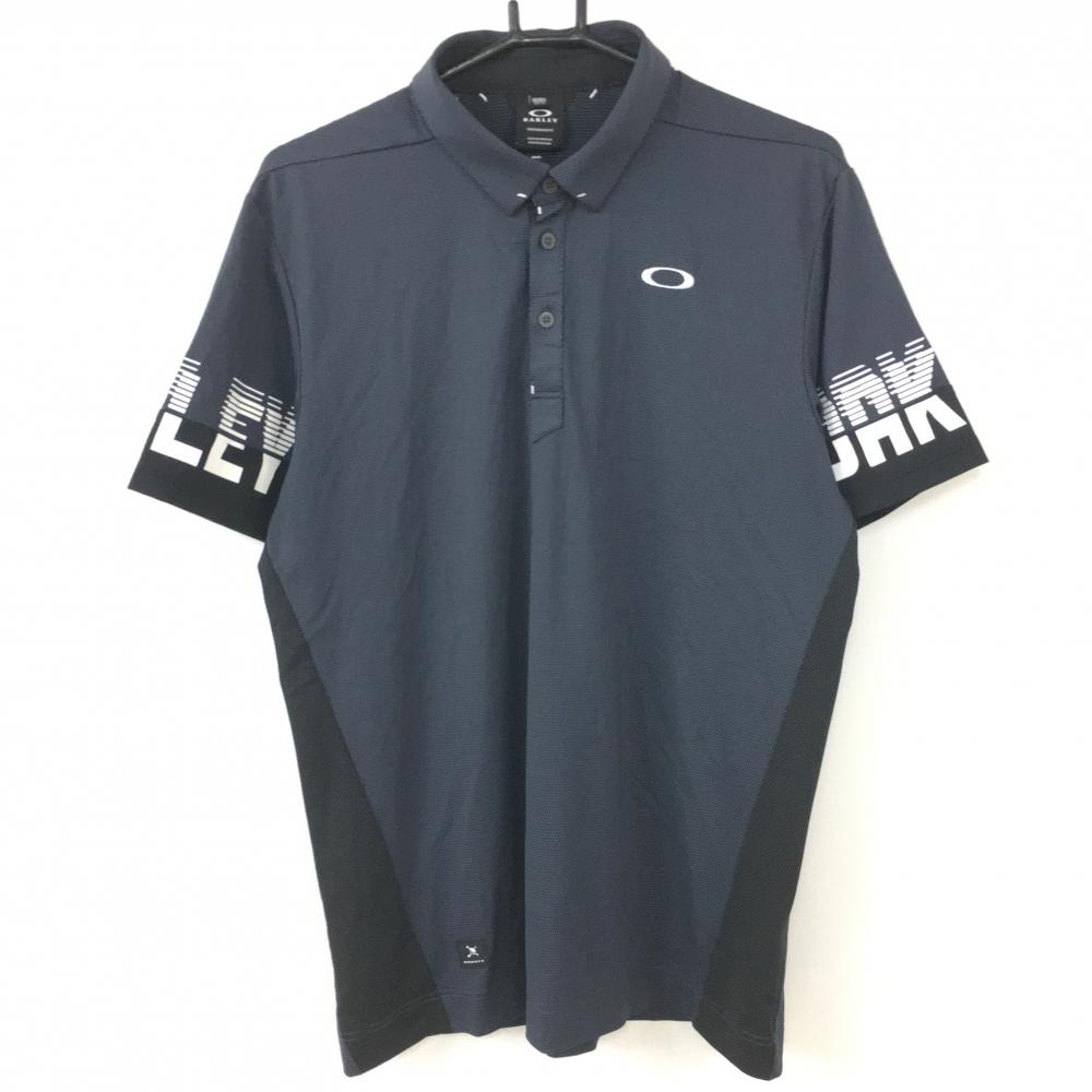 【超美品】Oakley オークリー 半袖ポロシャツ グレー×黒 織生地 袖ロゴ メンズ XL ゴルフウェア