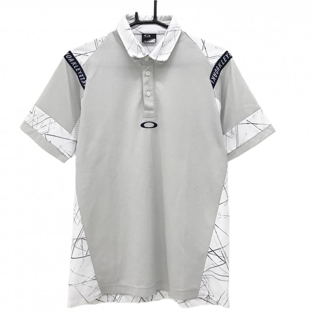【美品】オークリー 半袖ポロシャツ ライトグレー×白 背面総柄 ロゴ刺しゅう 二重襟  メンズ L ゴルフウェア Oakley