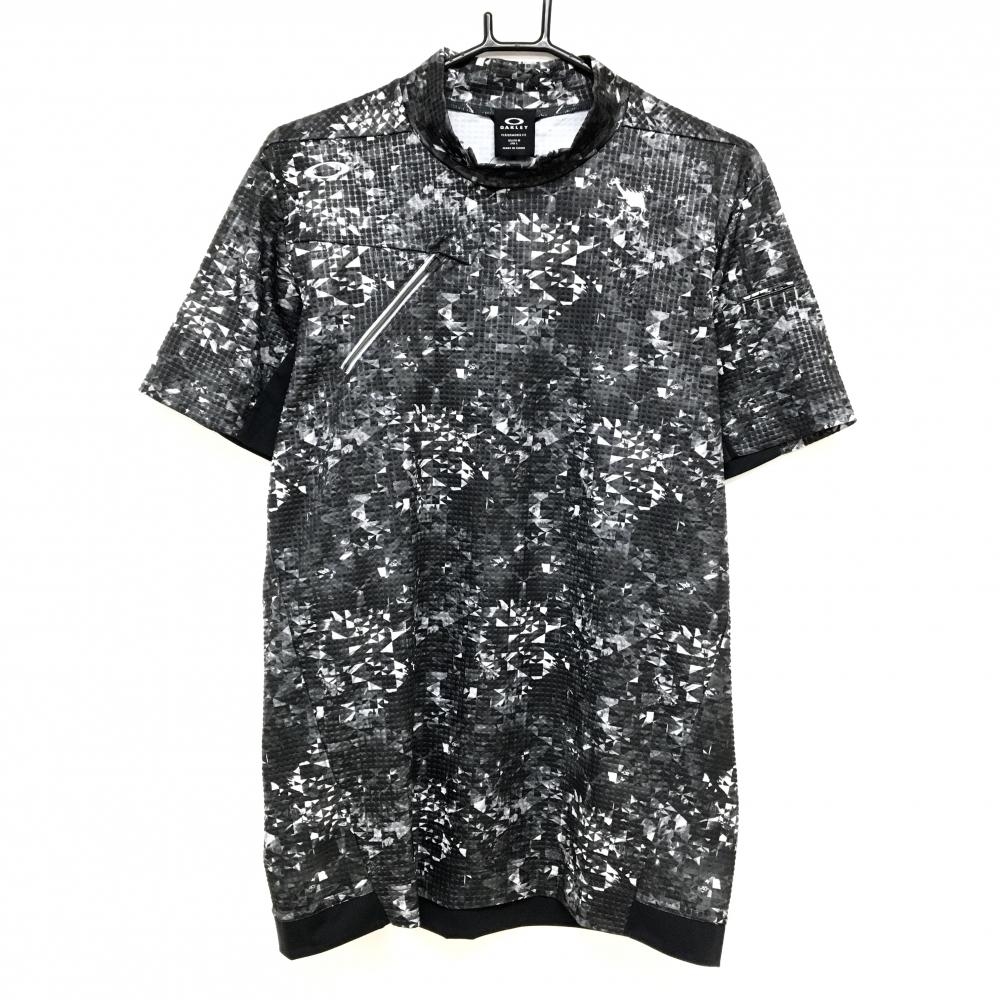 【新品】オークリー 半袖ハイネックシャツ グレー×黒 総柄織生地 吸汗速乾 ストレッチ   メンズ L ゴルフウェア 2024年モデル Oakley
