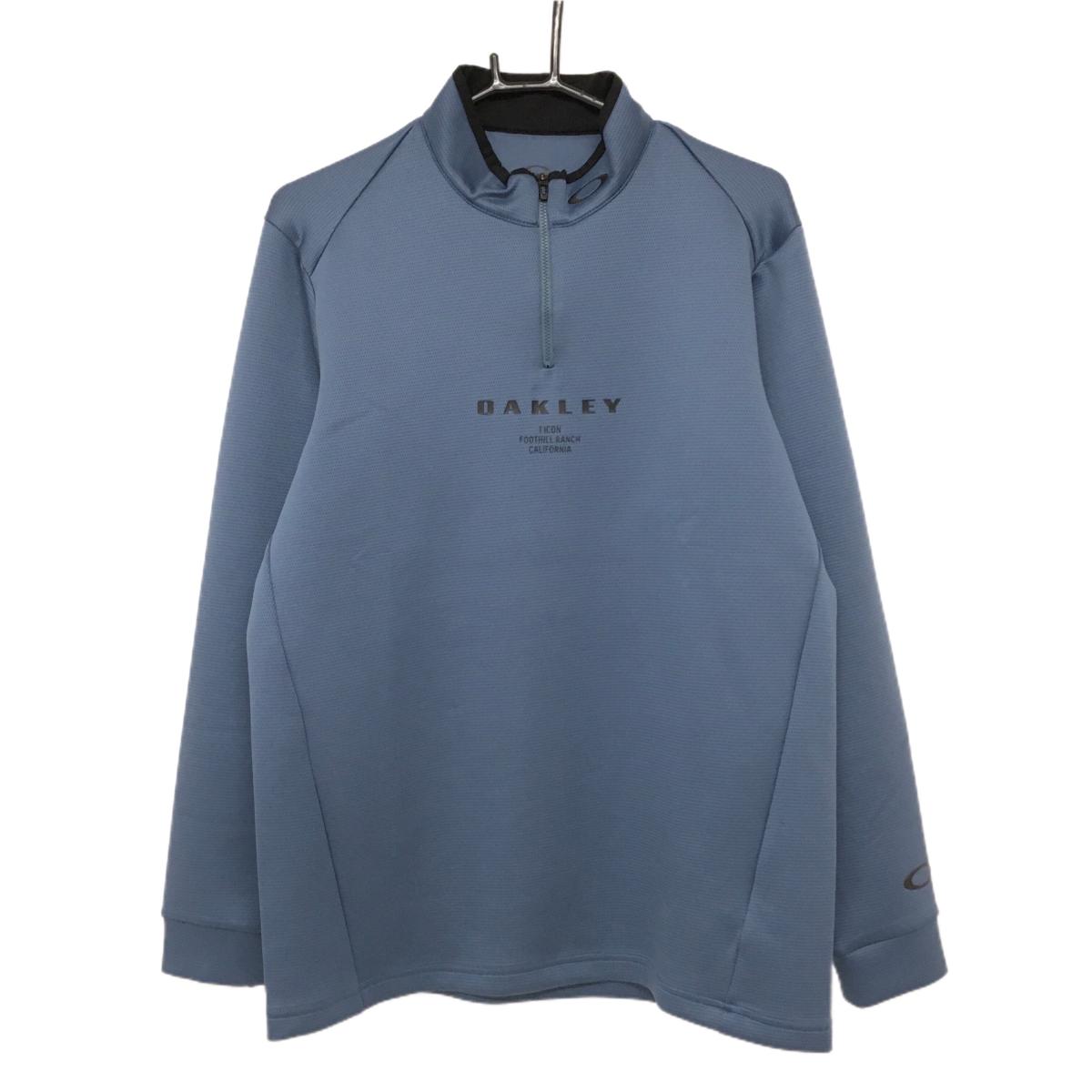 【超美品】オークリー 長袖ハイネックシャツ スモーキーブルー×黒 ハーフジップ ロゴ  メンズ M ゴルフウェア 2024年モデル Oakley