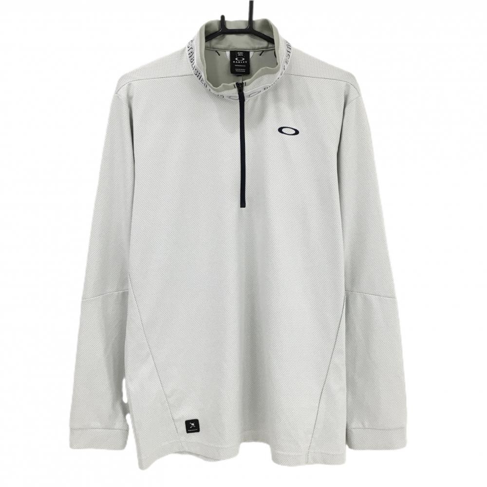 【美品】オークリー 長袖ハイネックシャツ 白×スモーキーグリーン系 総柄 ハーフジップ ネックロゴ  メンズ XL ゴルフウェア Oakley