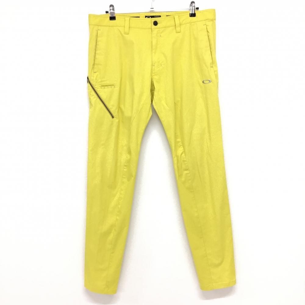 【美品】オークリー パンツ イエロー ティー装着可 スカル  メンズ 38 ゴルフウェア Oakley