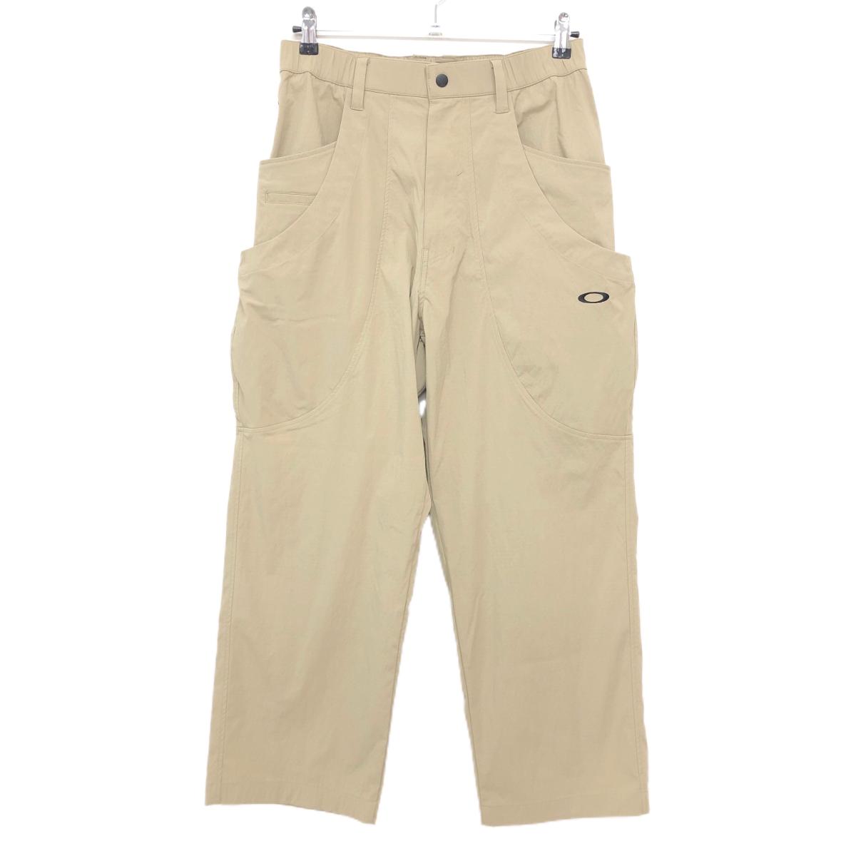 【超美品】オークリー パンツ ベージュ 格子柄地模様 CORDURA ナイロン混 メンズ M ゴルフウェア 2024年モデル Oakley