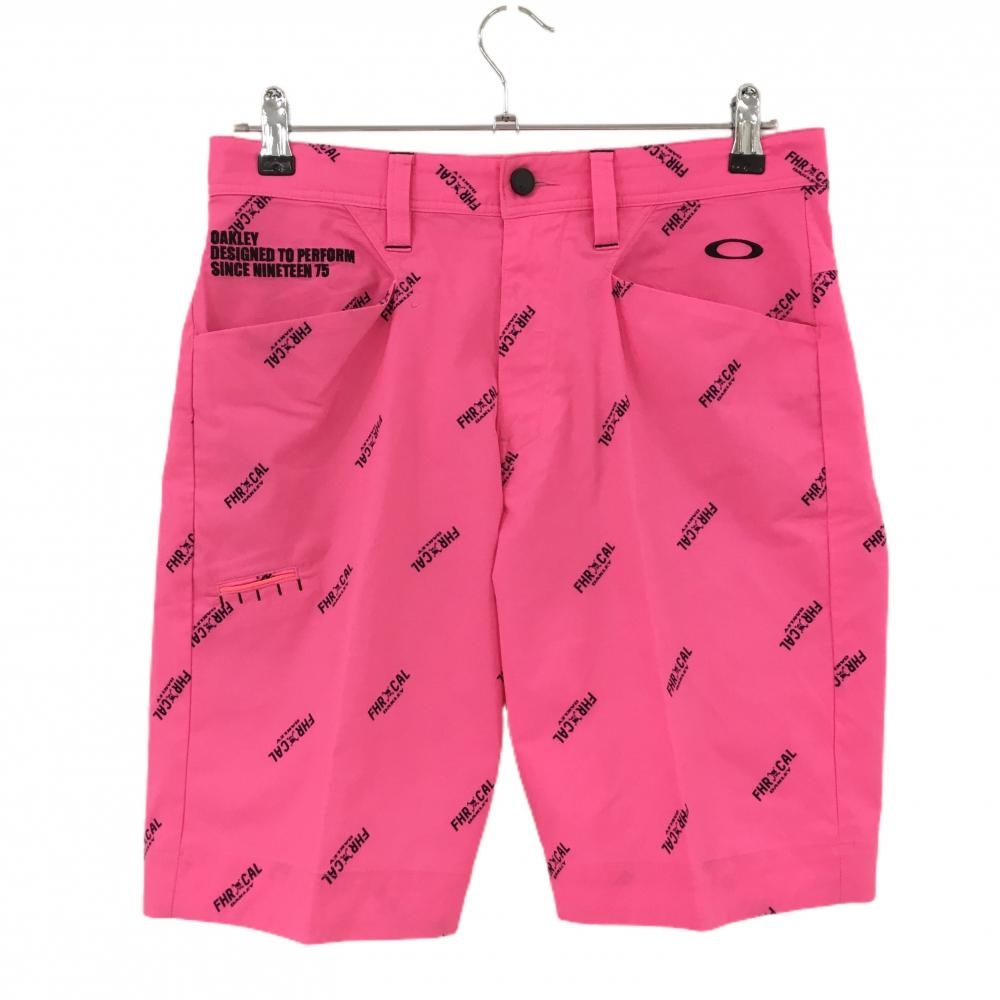 【超美品】オークリー ハーフパンツ 蛍光ピンク×ネイビー ロゴ総柄 ティー装着可 メンズ 32 ゴルフウェア Oakley