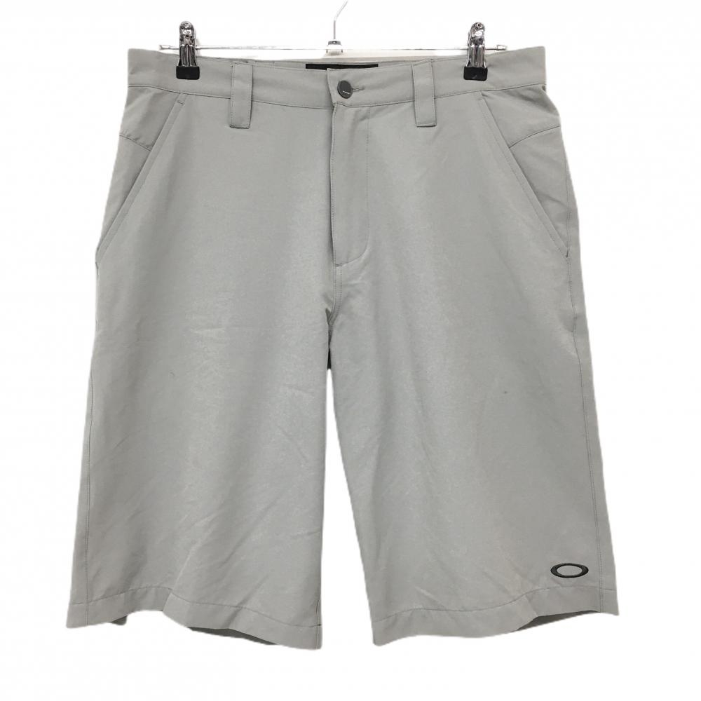 【美品】オークリー ハーフパンツ グレー ナイロン混 裾ロゴ  メンズ 32W ゴルフウェア Oakley