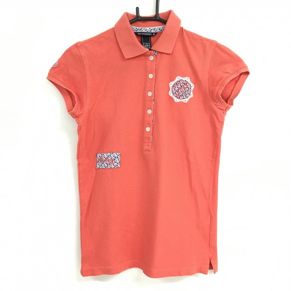 ゾーイ 半袖ポロシャツ オレンジ×白 ロゴ刺しゅう 前立て内側柄 レディース 38(M) ゴルフウェア ZOY