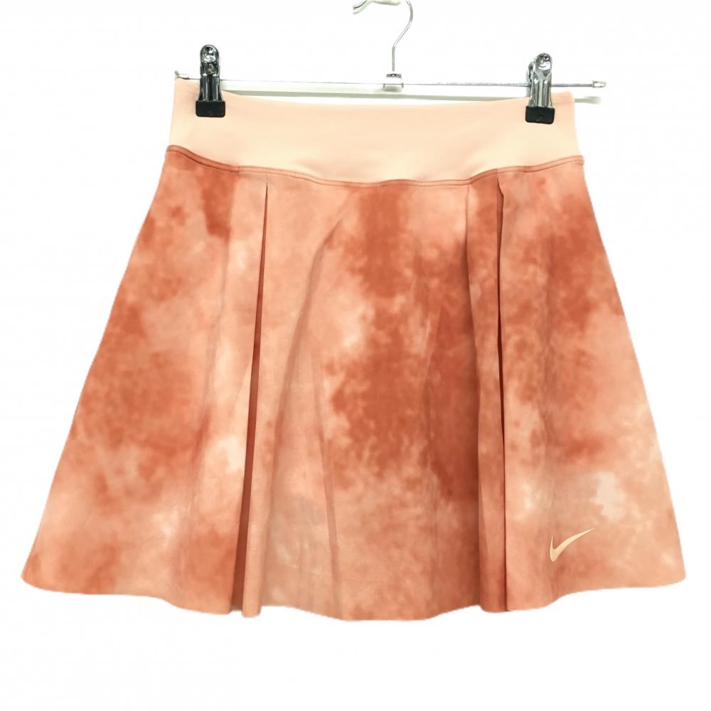 【超美品】ナイキ スカート ベージュピンク×レッド系 タイダイ柄 裾ロゴ ウエストゴム DRI-FIT レディース S ゴルフウェア NIKE