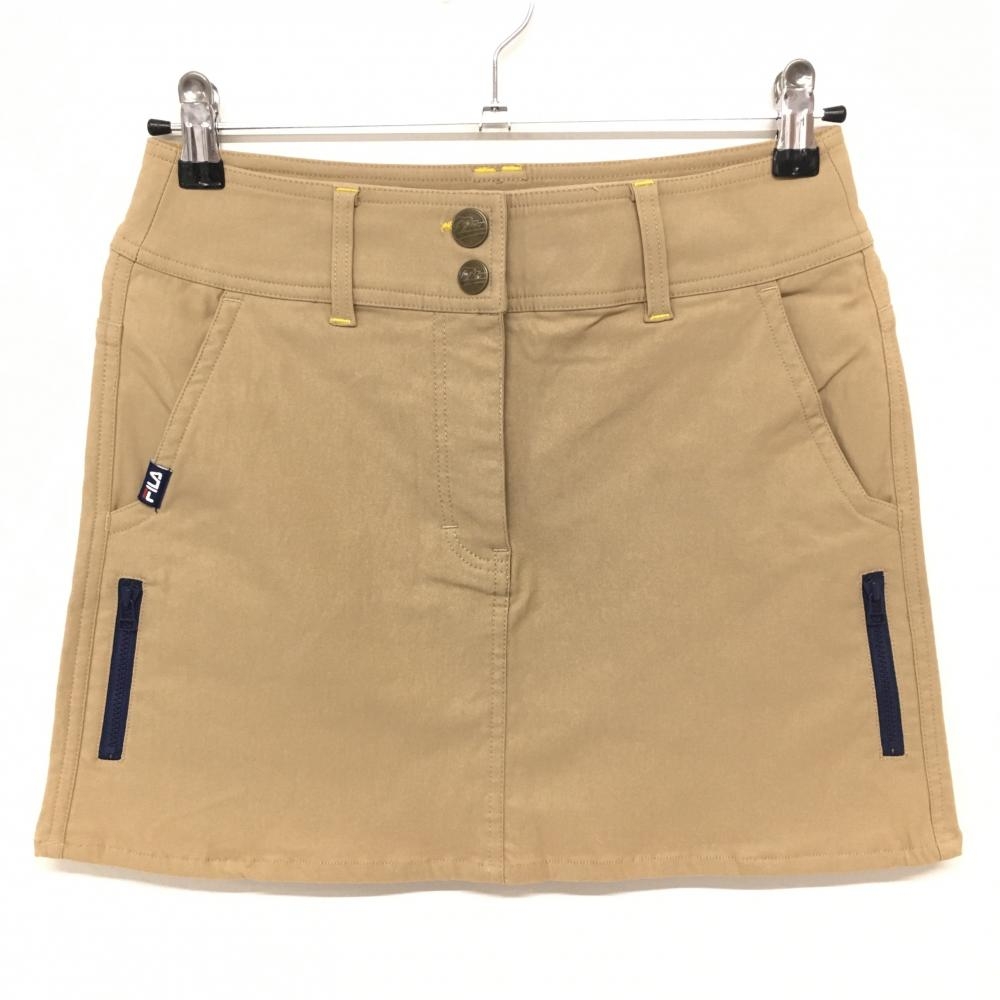 【超美品】フィラゴルフ スカート ベージュ 裏微起毛 後ろ複数ワッペン レディース S ゴルフウェア FILA GOLF