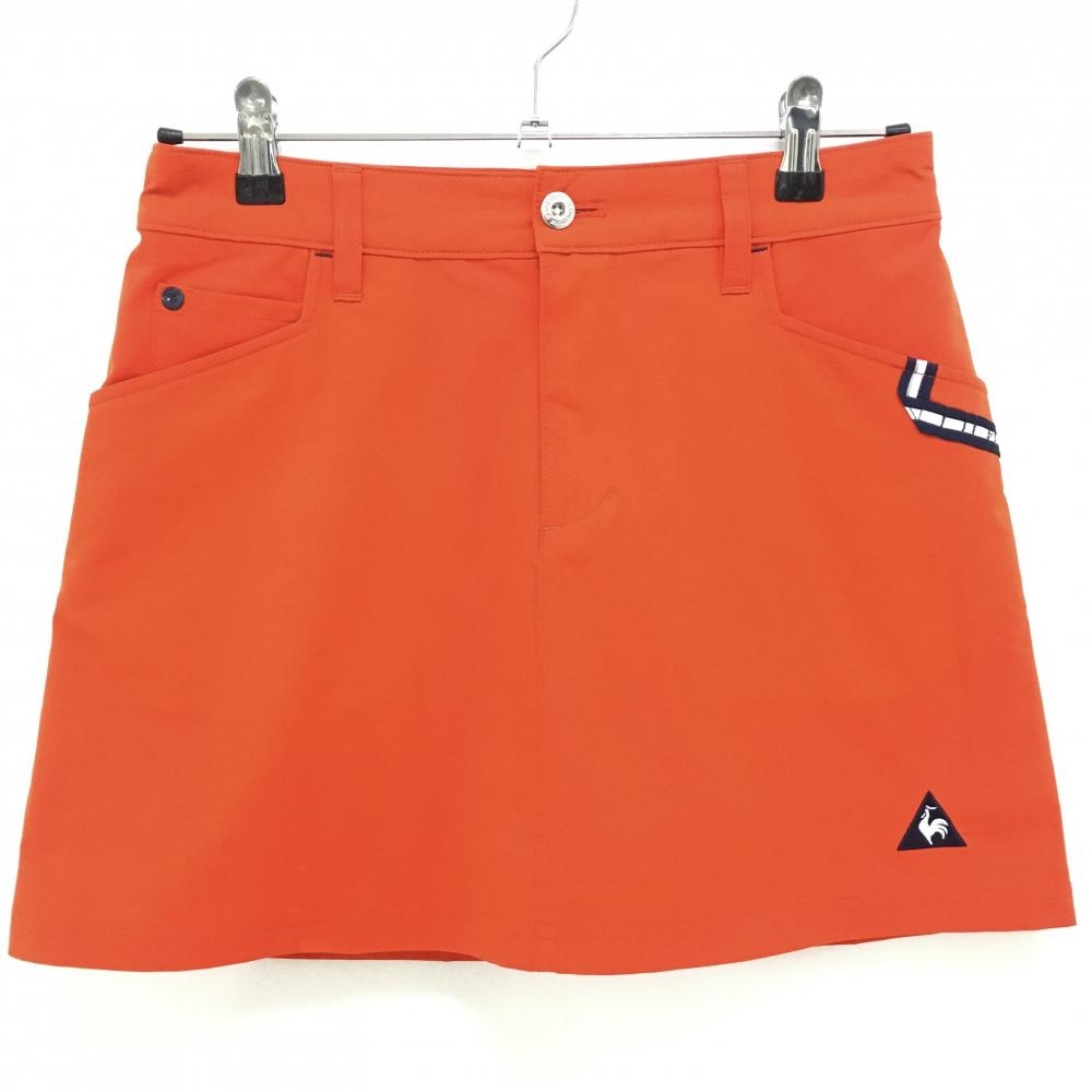 ルコック スカート オレンジ×ネイビー ロゴ刺しゅう 内側インナーパンツ 裾汚れ レディース M ゴルフウェア le coq sportif