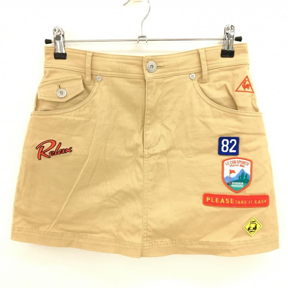 【超美品】ルコックゴルフ スカート ベージュ×オレンジ 複数ワッペン 内側インナーパンツ レディース 9 ゴルフウェア le coq sportif