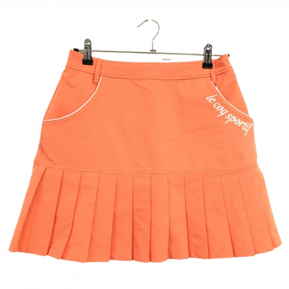 【新品】ルコックゴルフ スカート オレンジ 裾プリーツ ロゴ白  レディース 13 ゴルフウェア le coq sportif