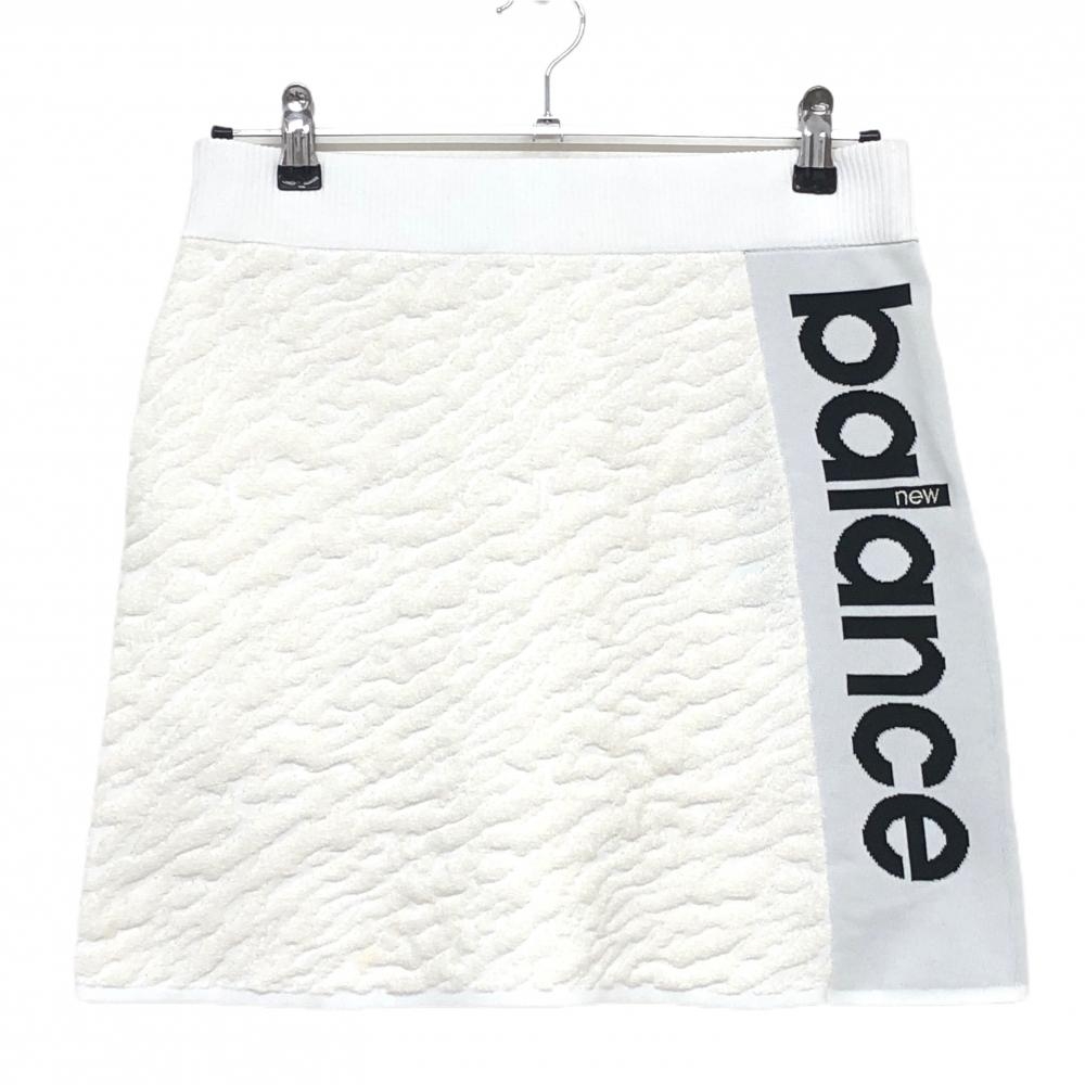 【新品】ニューバランスゴルフ ニットスカート 白 ゼブラ柄 ビッグロゴ黒 レディース 2(L) ゴルフウェア New Balance