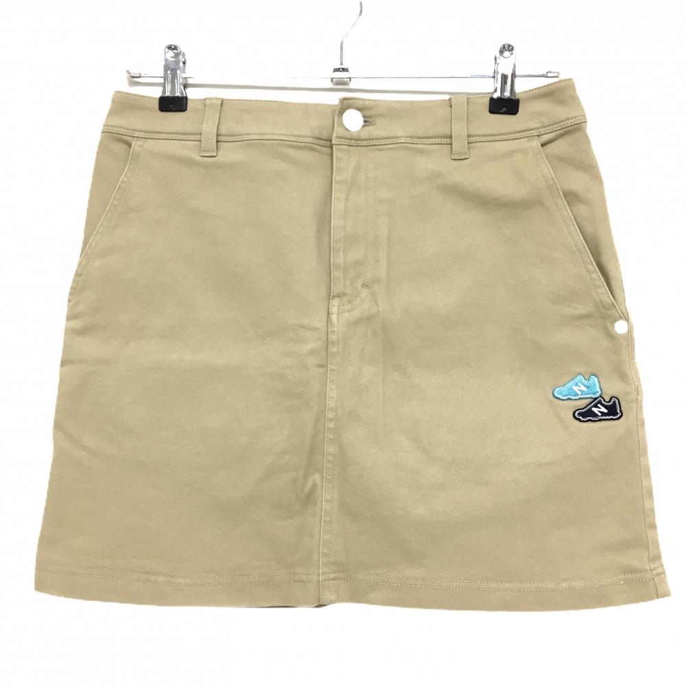 ニューバランスゴルフ スカート ベージュ スニーカーワッペン レディース 1(M) ゴルフウェア New Balance