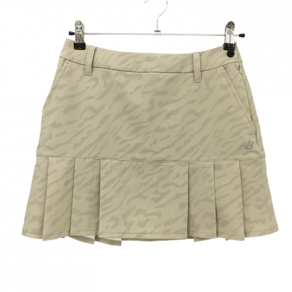 【超美品】ニューバランスゴルフ スカート ベージュ系 総柄 裾プリーツ レディース 0(S) ゴルフウェア New Balance