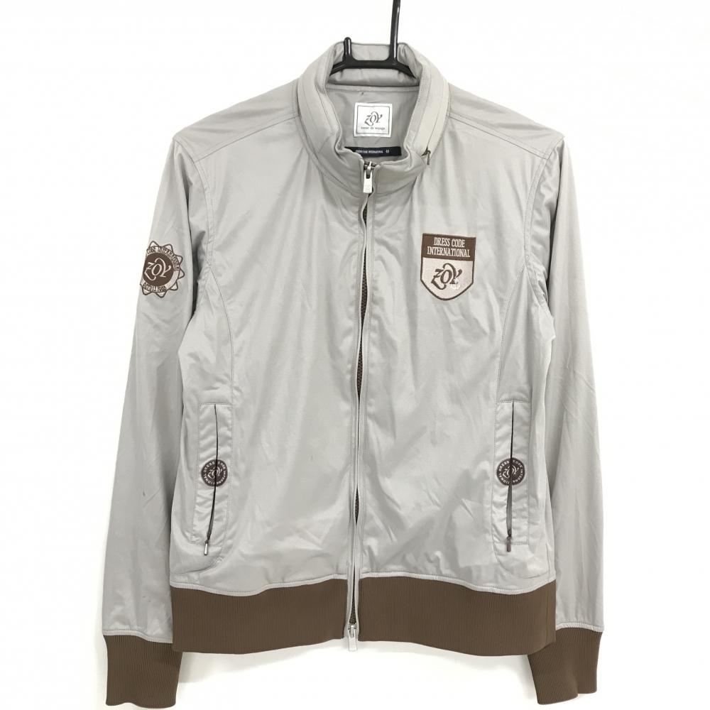 ゾーイ ジャケットブルゾン グレー×ブラウン 胸元ロゴ フード収納可 レディース 40(L) ゴルフウェア ZOY